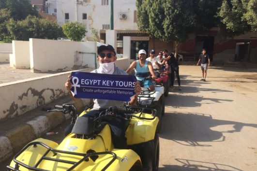 Men with Egypt Tours Banner